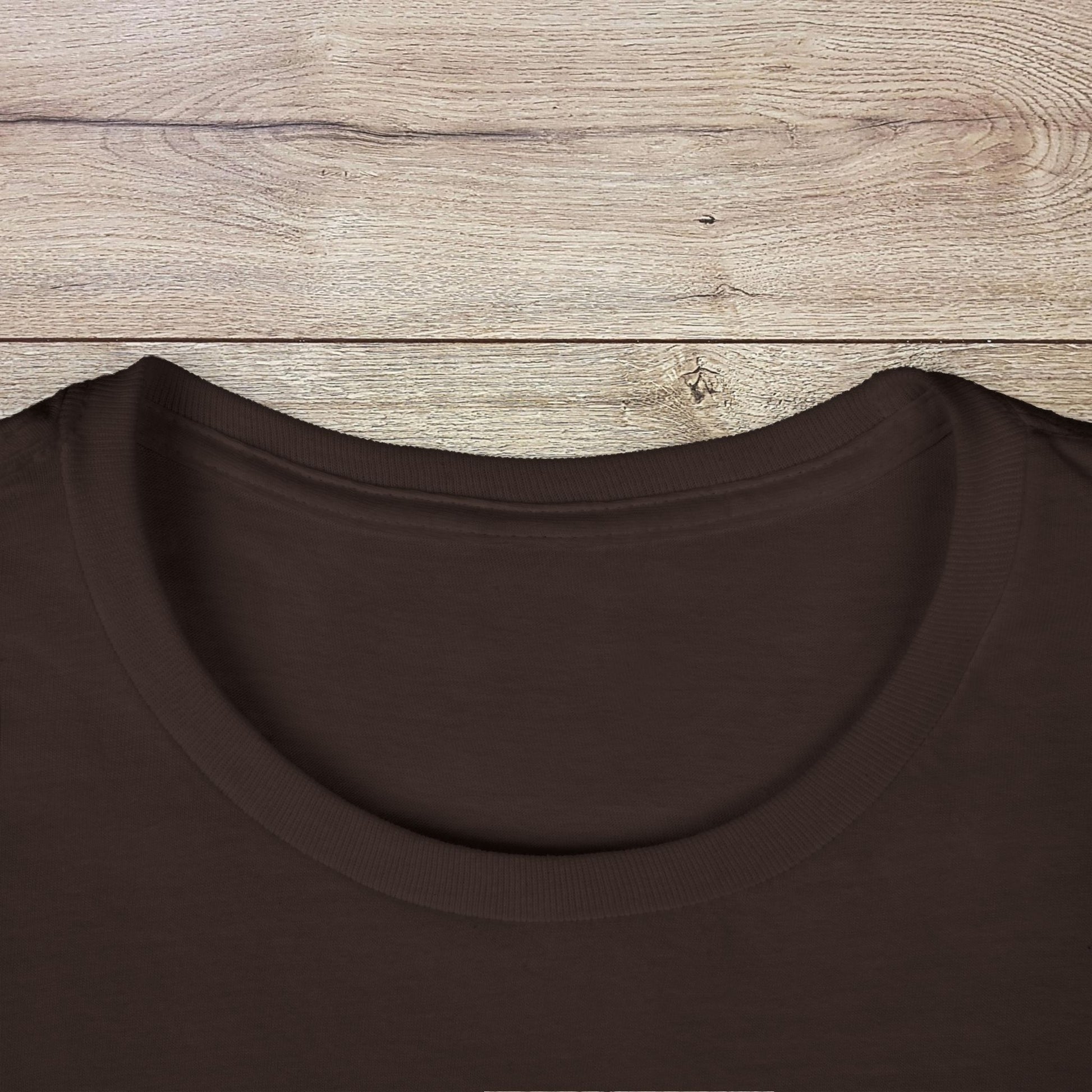 Close-up of the collar of the Golf Wives Social Club Tee in brown, showcasing the highly elastic ribbed knit that retains its shape.