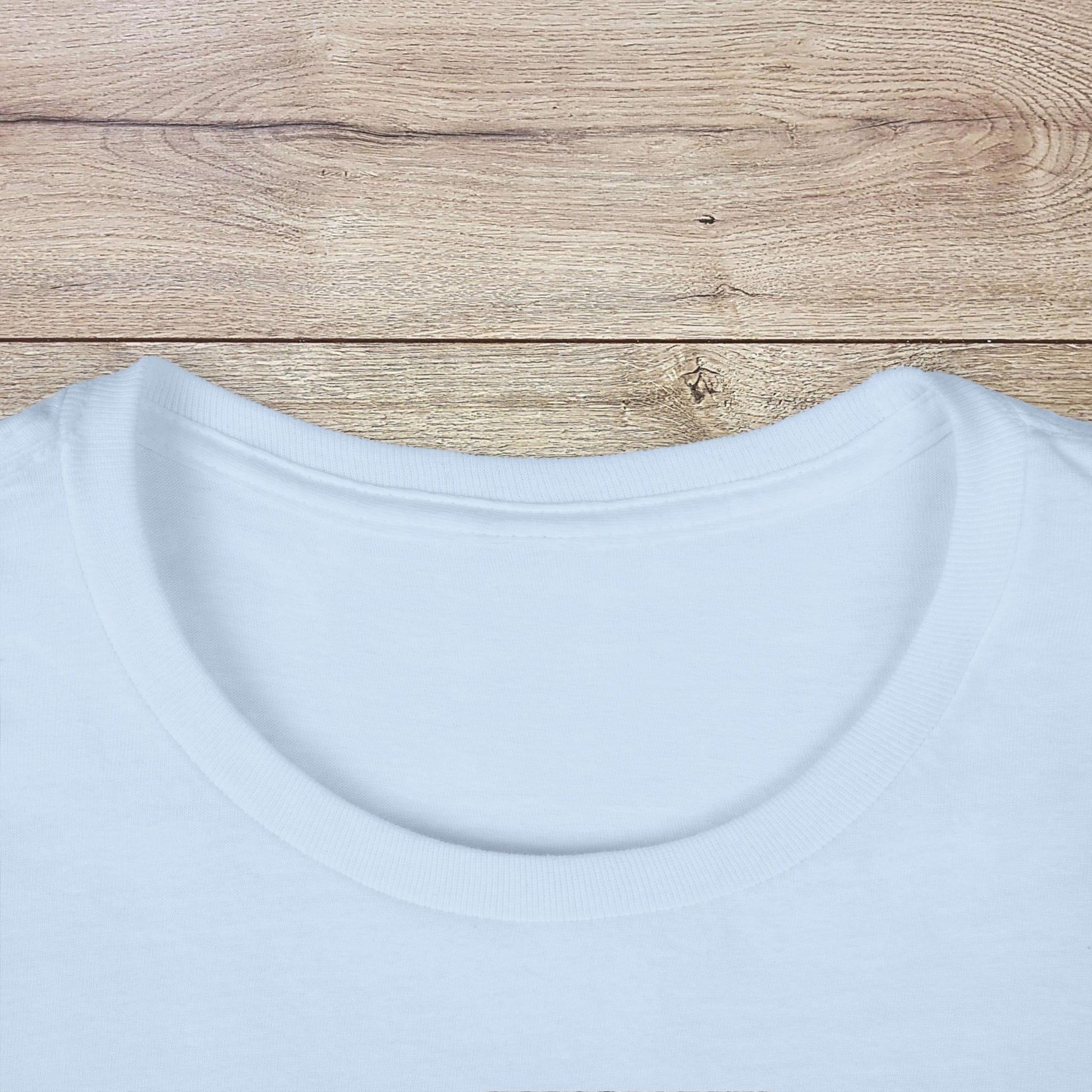 Close-up of the white neckline of the Golf Wives Social Club Tee, made from 100% ethically produced ring-spun cotton.