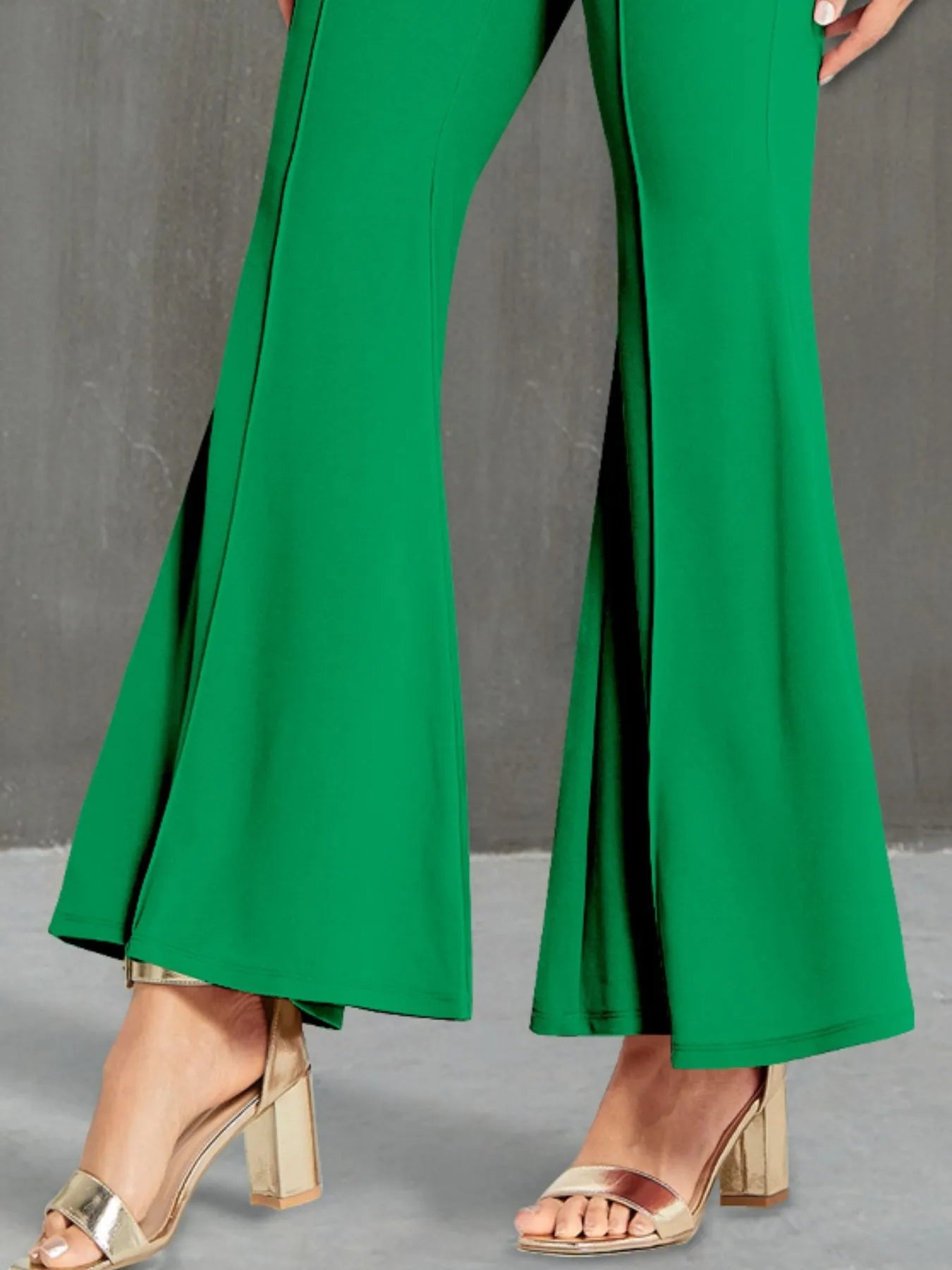 Stylish High Waisted Flare Pants with Decorative Buttons showcasing a vibrant green color, featuring a wide leg design perfect for a trendy outfit. Made with a comfortable blend of 95% Polyester and 5% Spandex.