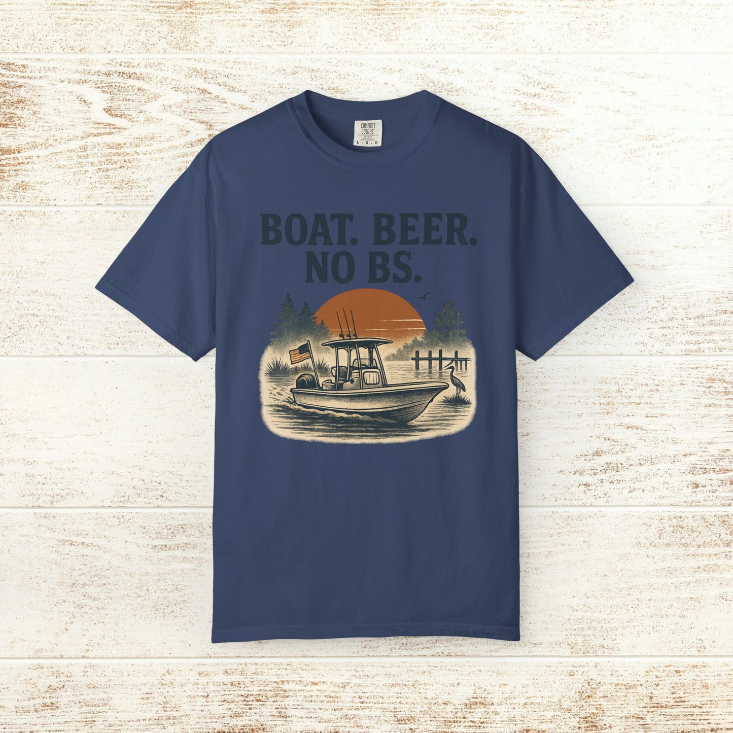 Boat Beer No BS Tee in navy blue with a design of a fishing boat against a sunset sky, great for beach days and relaxed outings.