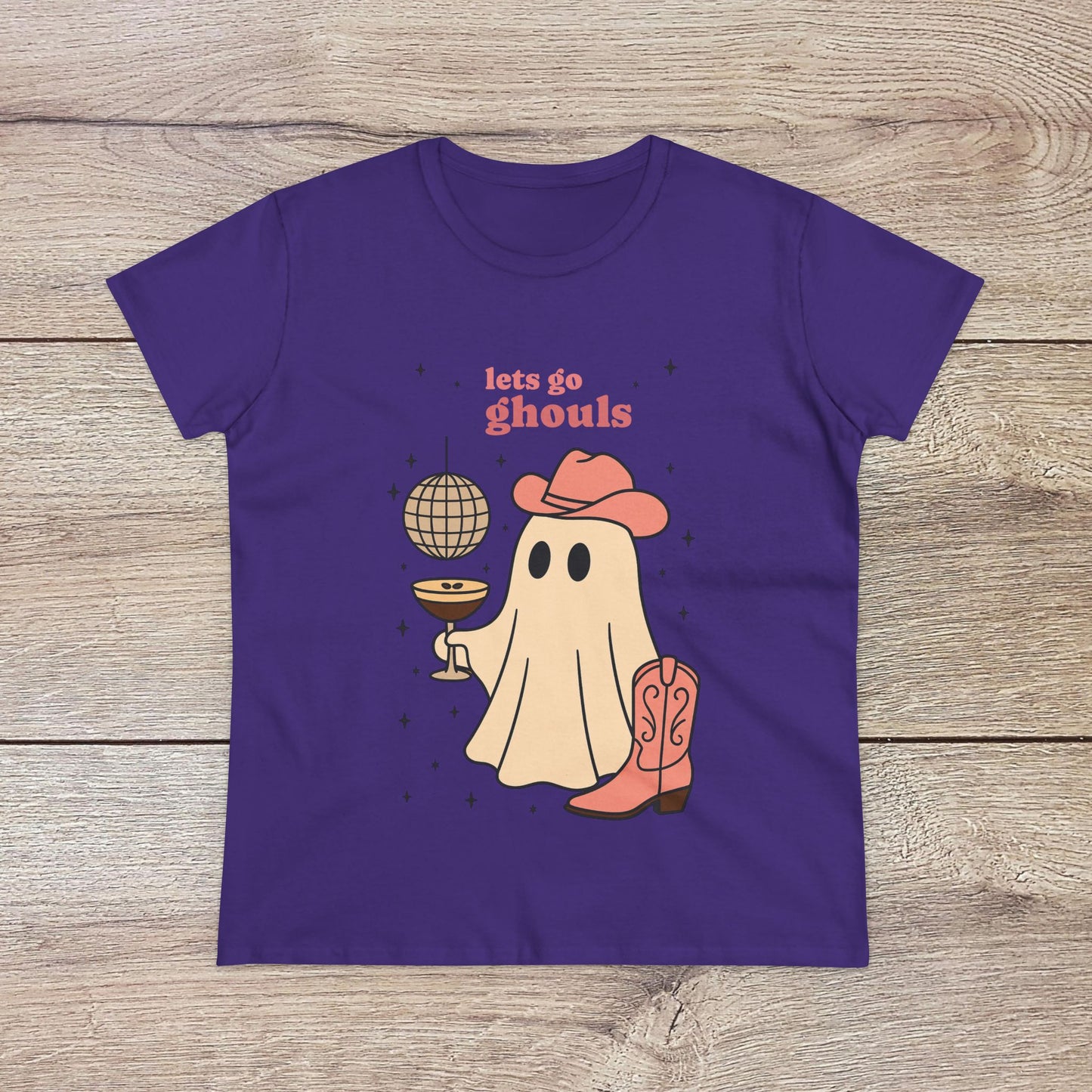Let's Go Ghouls Tee in deep purple showcasing a playful ghost character with a drink and cowboy hat, ideal for spooky season and stylish comfort.
