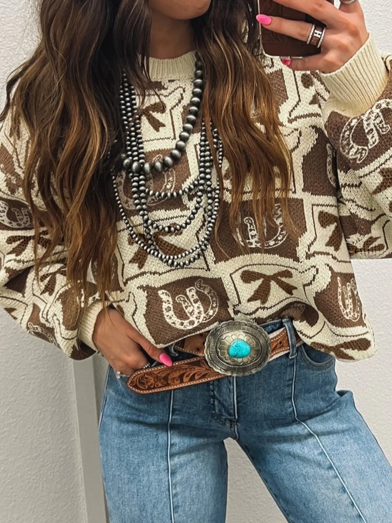 Trendy Graphic Round Neck Long Sleeve Sweater - Soft Viscose Blend with Stretch, highlighted in a close-up view, complete with trendy necklaces and stylish denim, perfect for a chic and comfortable outfit.
