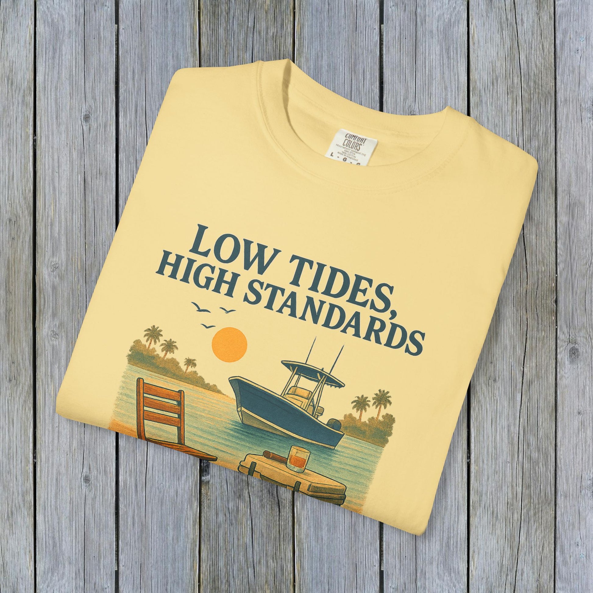 Garment-Dyed Low Tides High Standards T-Shirt in soft yellow, featuring an eye-catching boat graphic and perfect for expressing your relaxed vibe.