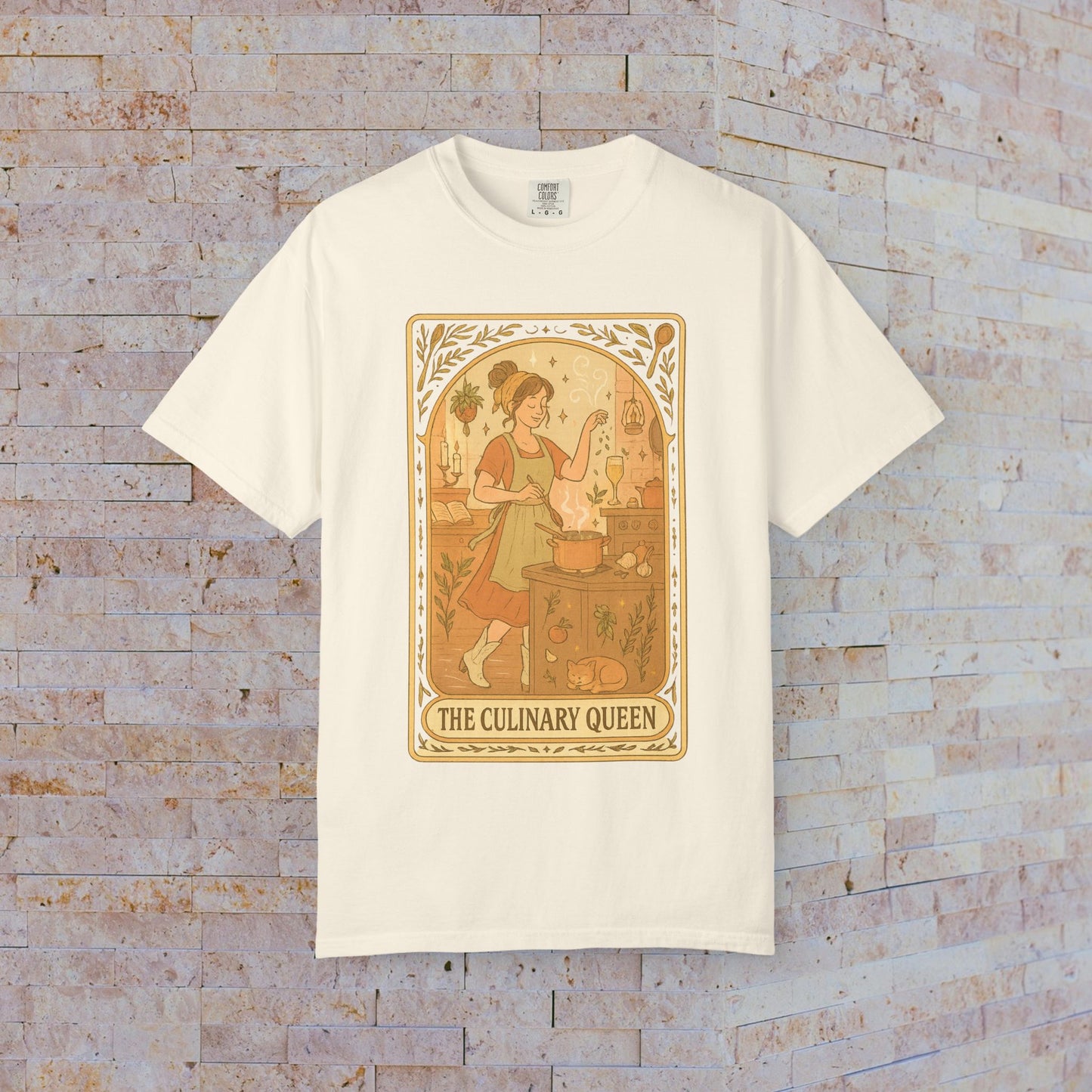Culinary Queen Tarot Tee in white, displaying a whimsical design of the culinary queen in action, available in sizes S to 4XL, made from soft, pre-shrunk cotton.