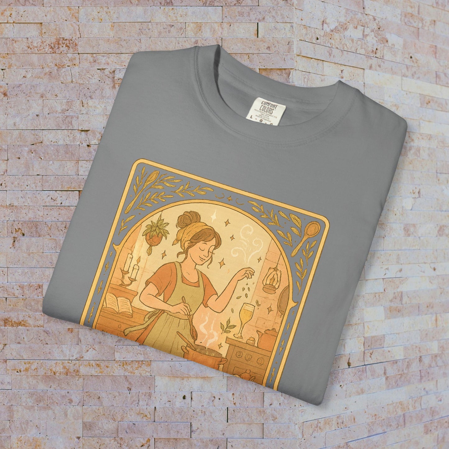 Culinary Queen Tarot Tee in gray, showcasing a whimsical illustration of a woman blending ingredients, sizes S to 4XL, crafted from soft pre-shrunk cotton.