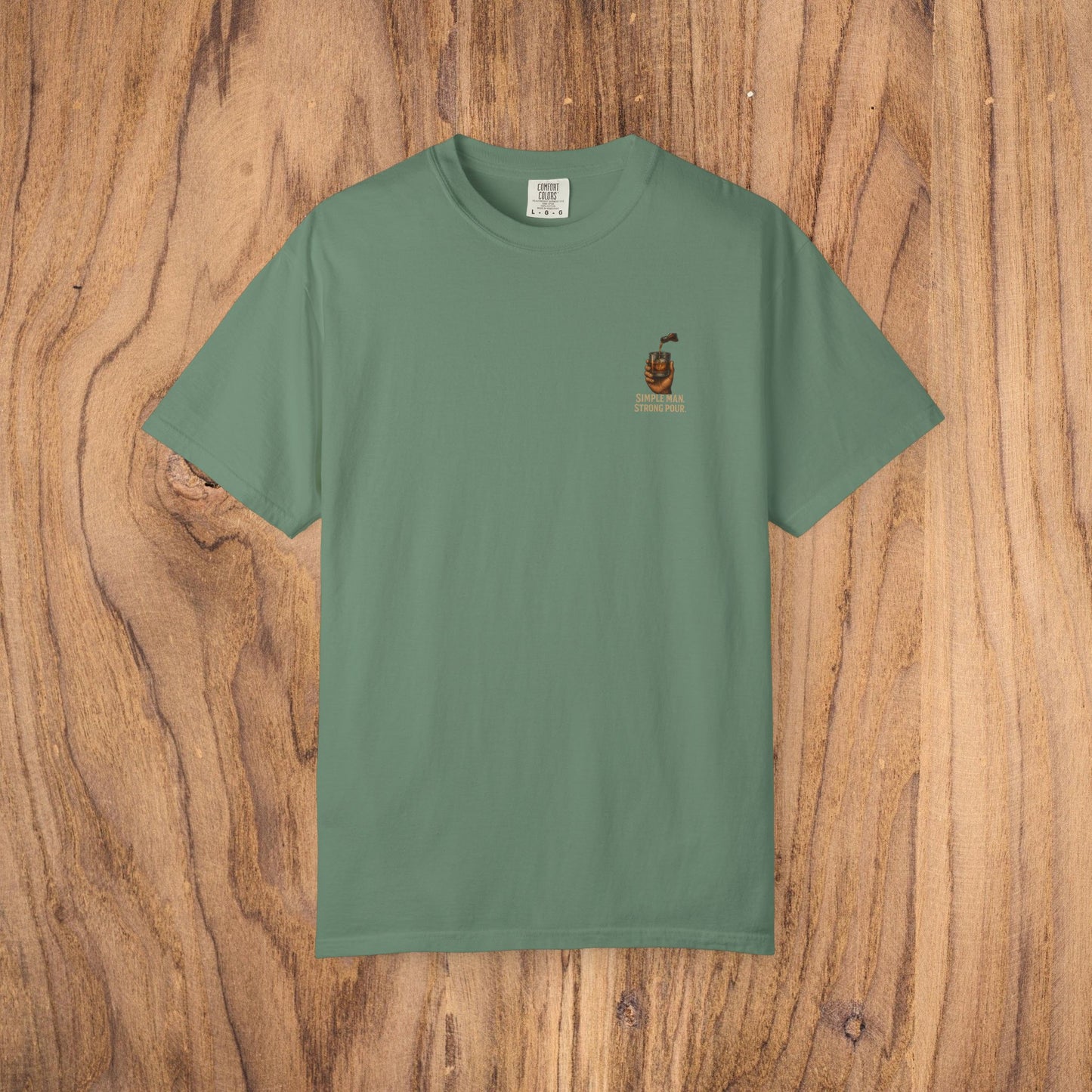 Simple Man Strong Pour T-Shirt in sage green, crafted from 100% cotton, offering a comfortable fit and ethical sourcing.