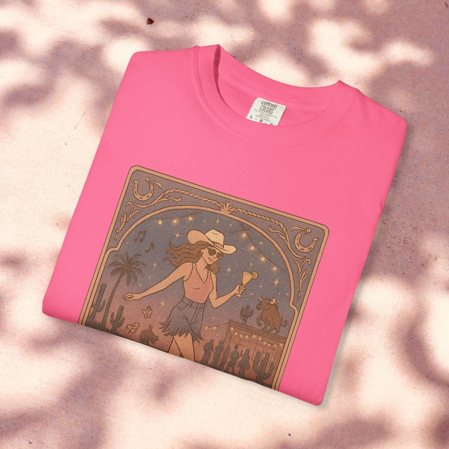 Line Dancer Tarot Tee in vibrant pink, featuring a captivating design of a dancing girl and desert scenery, made from comfortable soft cotton and produced ethically.