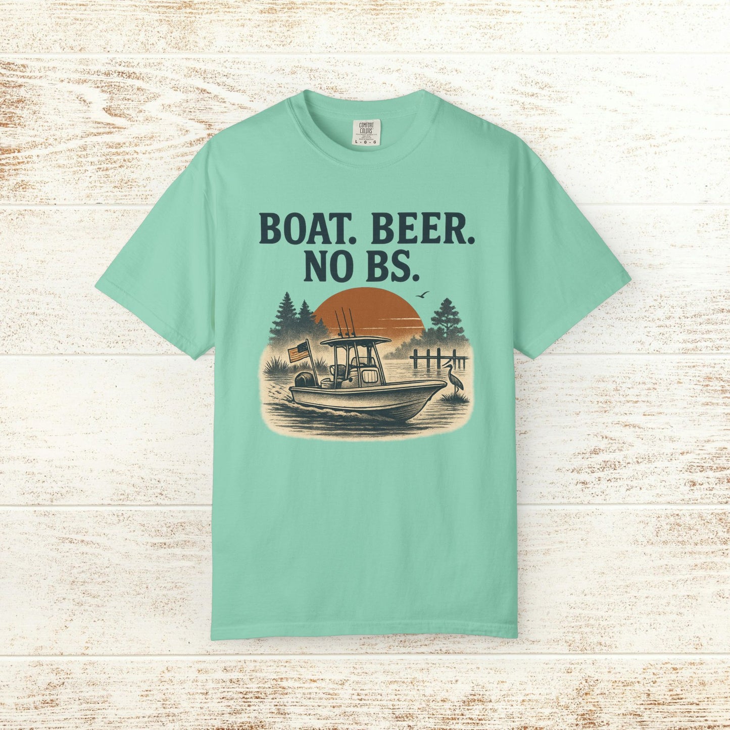 Boat Beer No BS Tee in mint green, showcasing a vibrant graphic of a fishing boat at sunset with the slogan 'BOAT. BEER. NO BS.', ideal for summer outings.