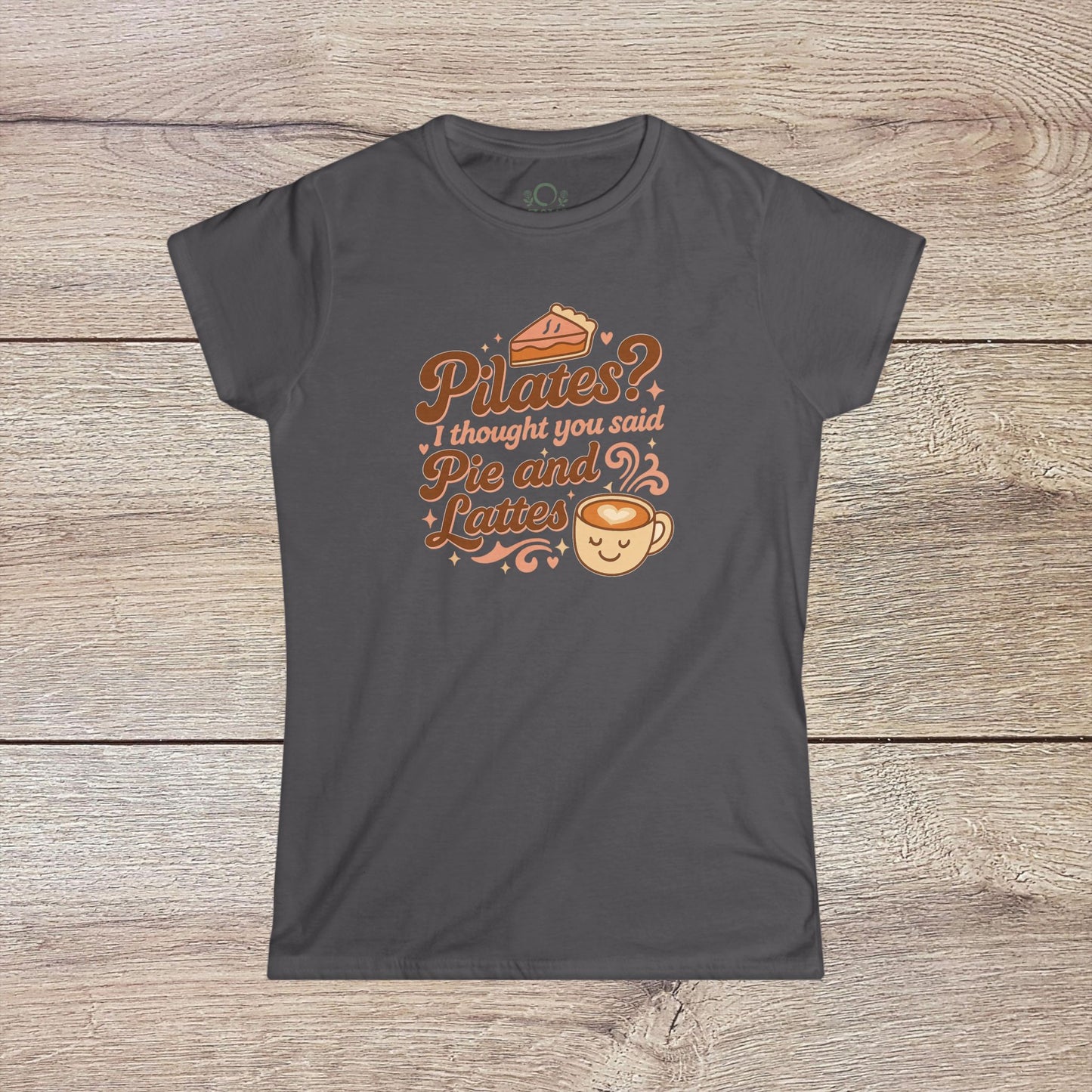 Funny Pilates T-Shirt with Durable Shoulder Tape and Classic Fit for Everyday Comfort in charcoal, highlighting a lighthearted graphic that merges Pilates with pie and lattes.