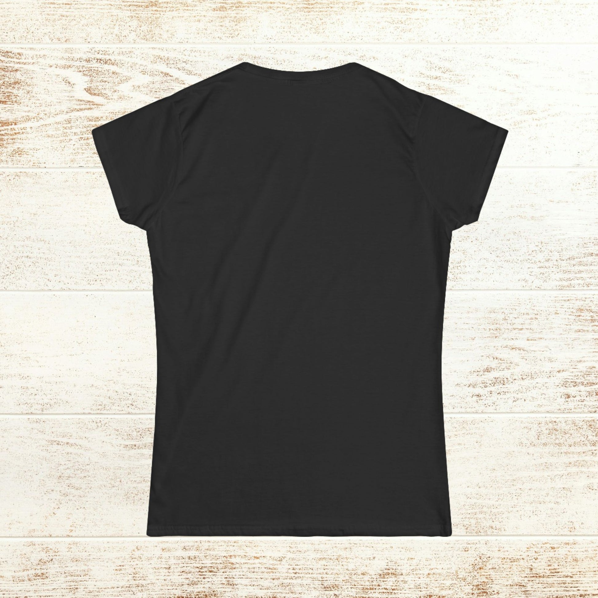 Back view of the No Bad Vibes Tee, demonstrating a clean, seamless design in classic black, emphasizing comfort and simplicity.