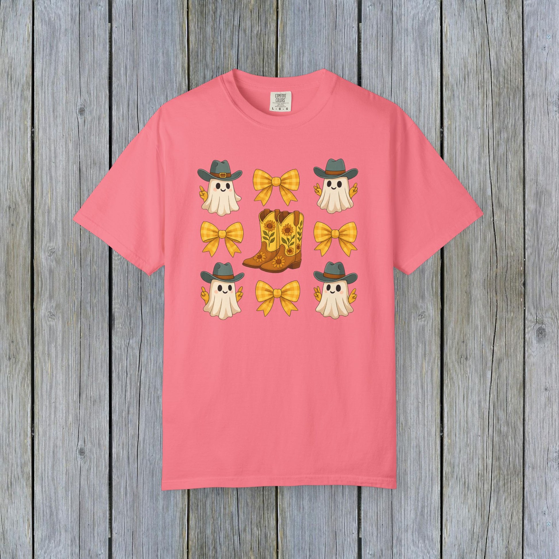 Cute Halloween T-Shirt illustrating fun ghosts in cowboy hats alongside cowboy boots and yellow bows, perfect for unisex fall fashion, made with eco-friendly fabric.