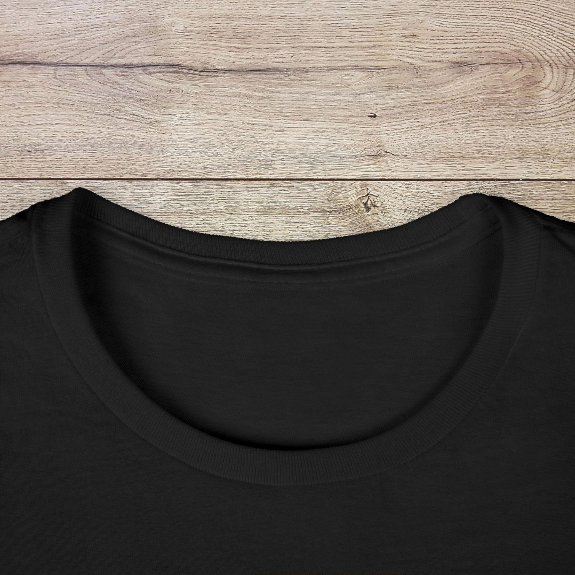 Close-up of the collar on the Golf Wives Social Club Tee in black, highlighting the elastic ribbed knit that retains its shape.