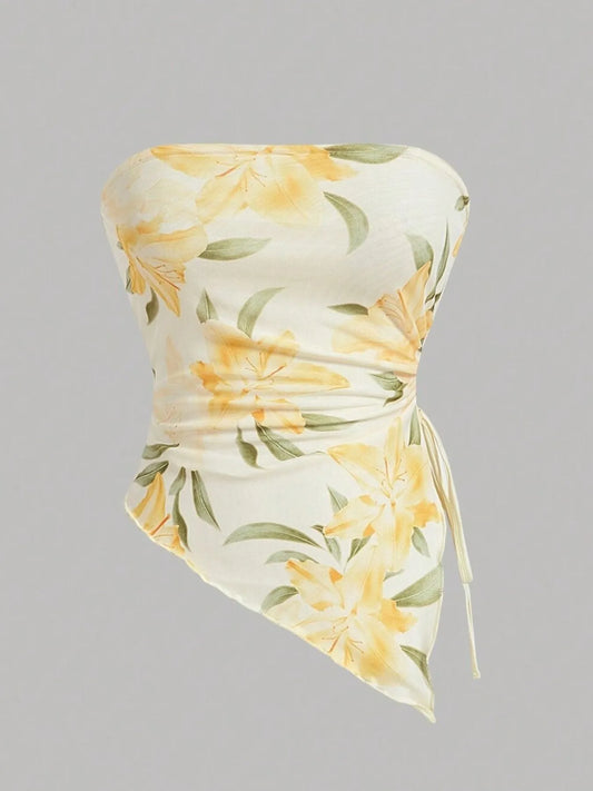 Trendsi Asymmetrical Drawstring Printed Tube Top featuring a floral design with yellow flowers, ruched detailing, and a slightly stretchy fabric, ideal for women's fashion.