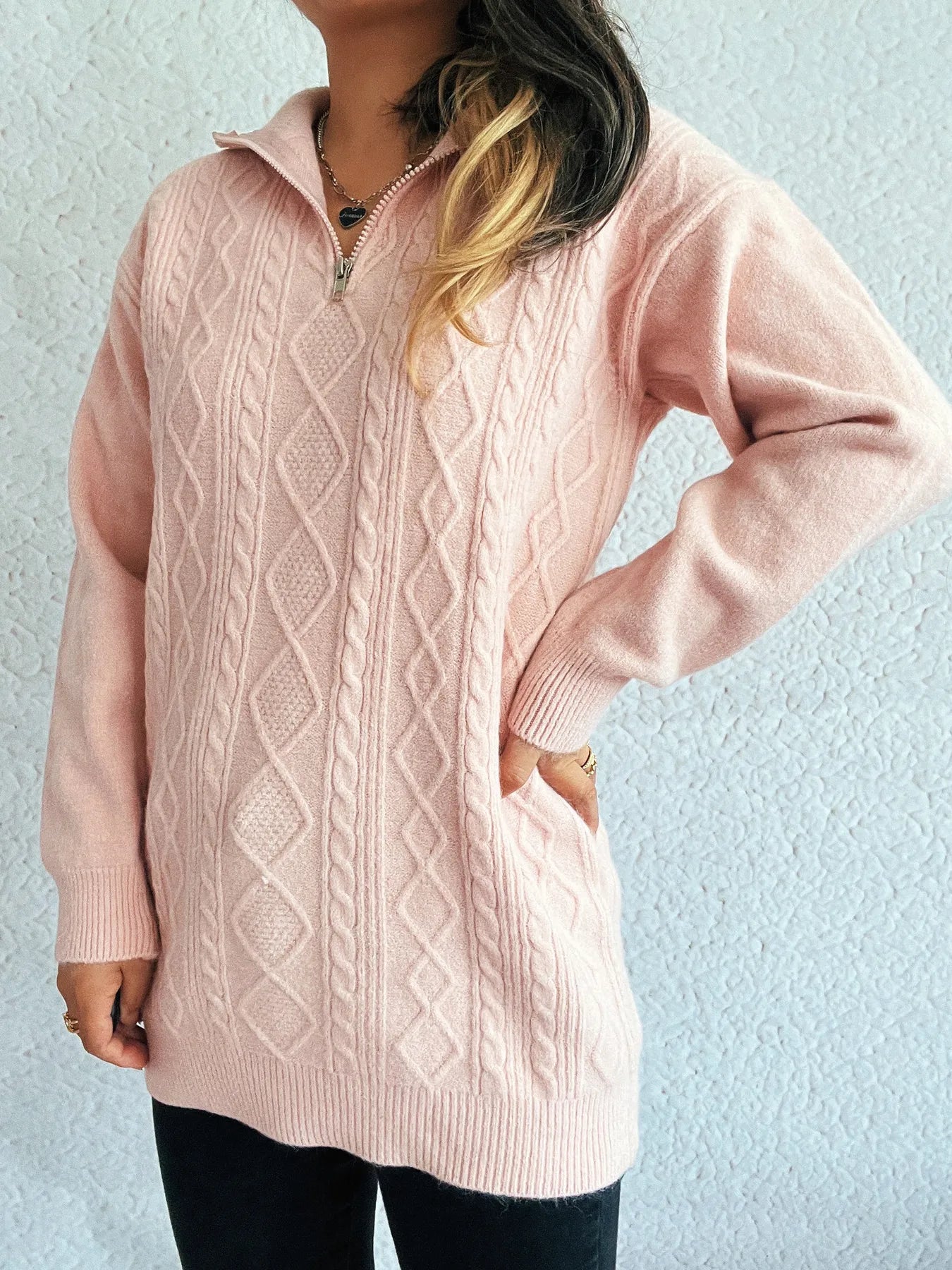 Side angle of the Cozy Cable-Knit Texture Zip Collar Long Sleeve Sweater, highlighting its stylish zip collar and slightly stretchy fabric, a great addition to your wardrobe.