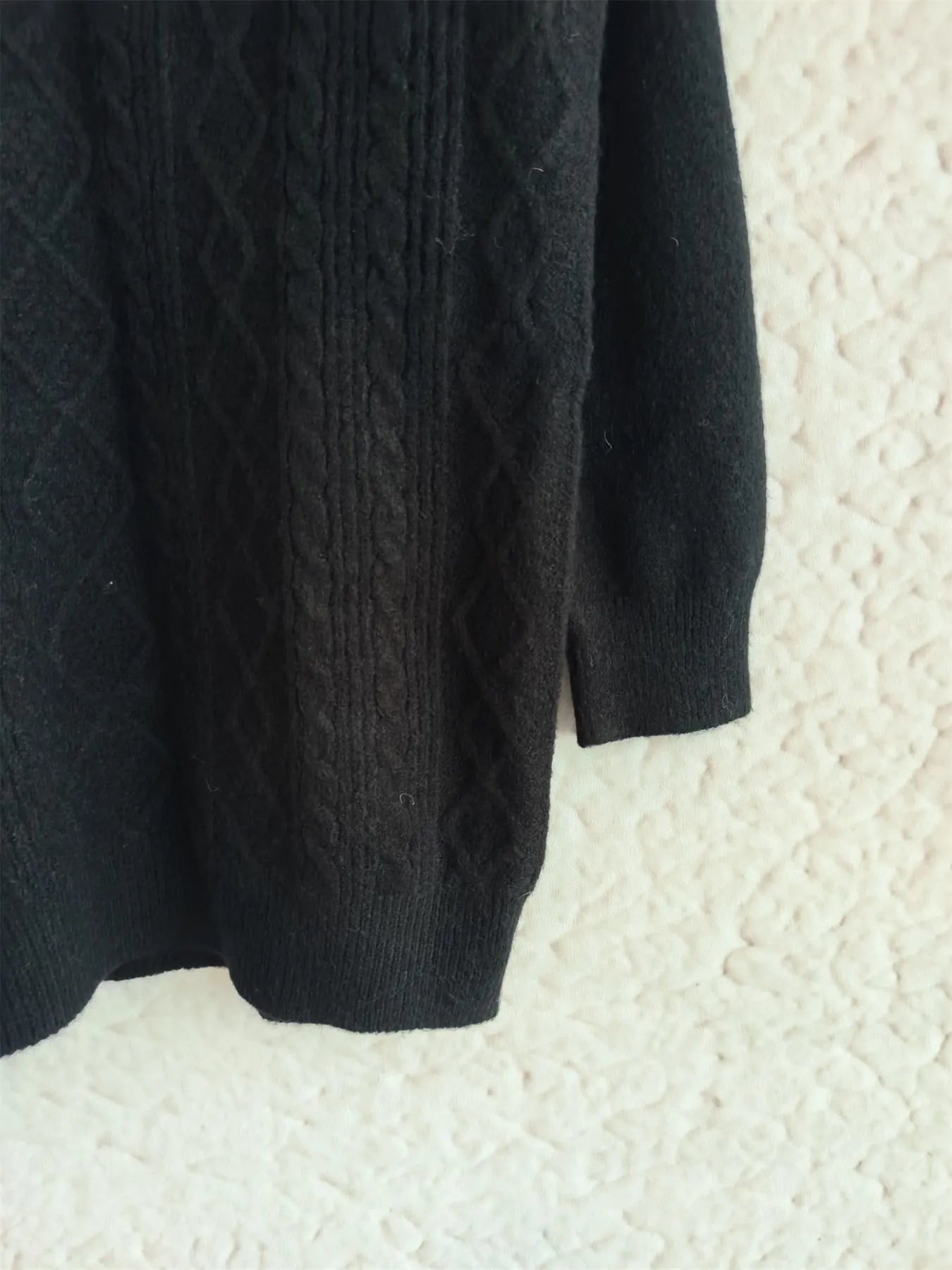 Close-up of the Cozy Cable-Knit Texture Zip Collar Long Sleeve Sweater showcasing its textured fabric and elegant fit, perfect for a comfortable yet chic look.