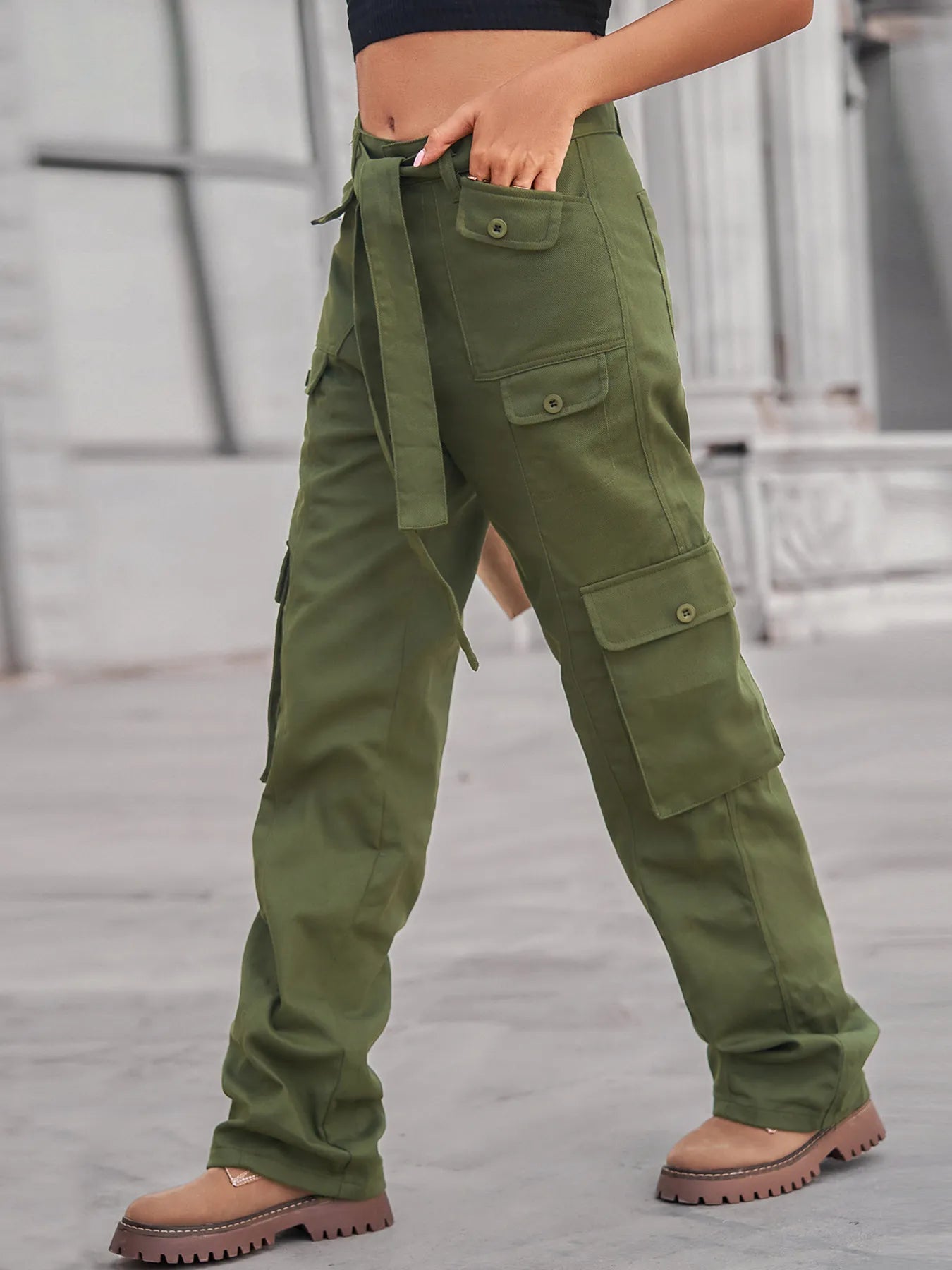 High-Waisted Multi-Pocket Cargo Jeans in olive green, highlighting side pockets and a relaxed fit, ideal for casual wear.