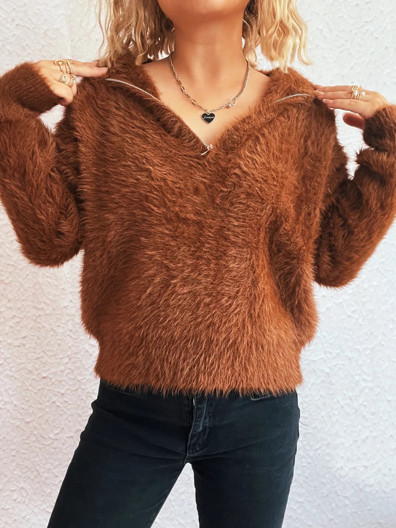 Close-up view of Cozy Fuzzy Half-Zip Sweater for Women in rich brown color, emphasizing its luxurious fuzzy texture and fashionable half-zip style, ideal for a trendy winter look.