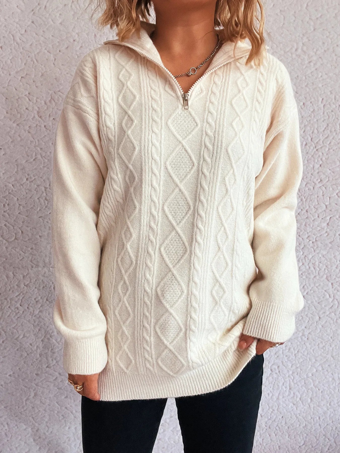 Chic Cozy Cable-Knit Texture Zip Collar Long Sleeve Sweater in creamy white, designed with a zip collar and a cozy fit, ideal for layering.