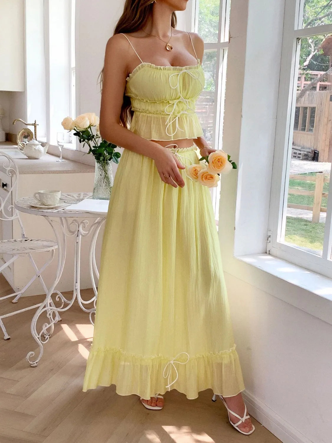 Front view of model in a Two-Piece Frill Square Neck Cami and Ruched Skirt Set in Stretchy Lyocell Blend in yellow, with a soft, flowing style.