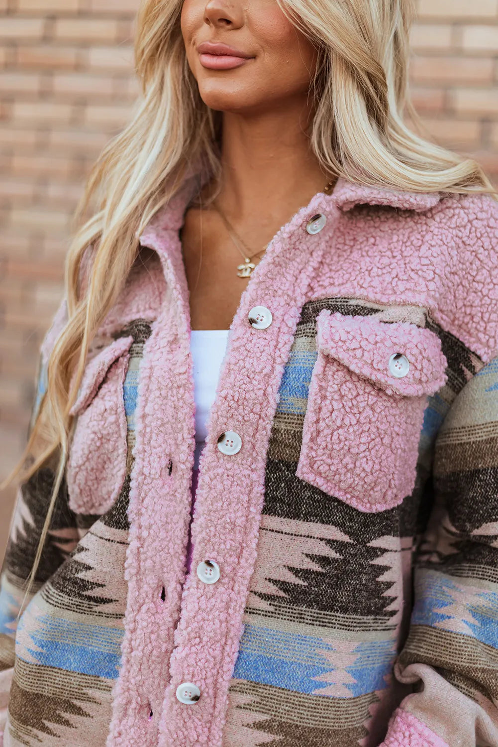 Close-up of the Trendsi Button Up Long Sleeve Jacket, focusing on the button details and soft fleece texture, perfect for layering.