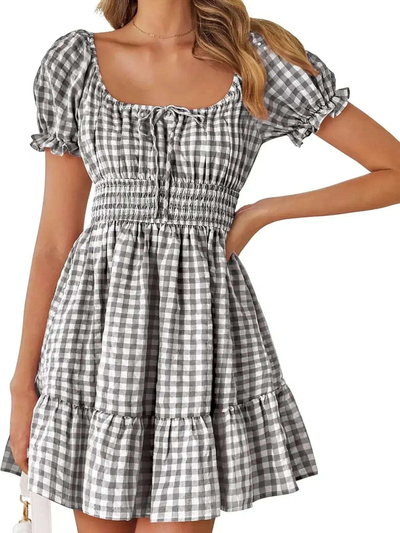Women's Gingham Puff Sleeve Smocked Dress in classic black and white gingham, featuring puff sleeves and a flirty hem, a stylish choice for summer events.