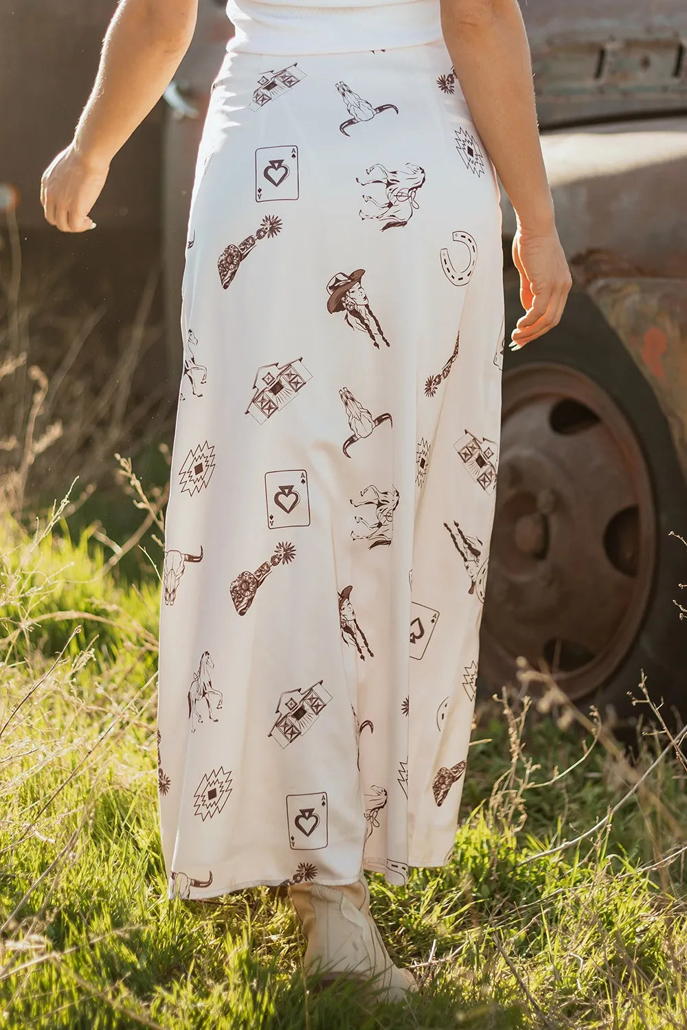 Back view of Trendsi Western Print Satin Long Skirt, displaying intricate western designs on a lightweight fabric, ideal for casual or dressy occasions.