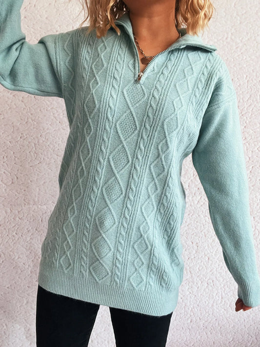 Cozy Cable-Knit Texture Zip Collar Long Sleeve Sweater displayed with a relaxed fit, showcasing its elegant cable-knit texture and versatile design.