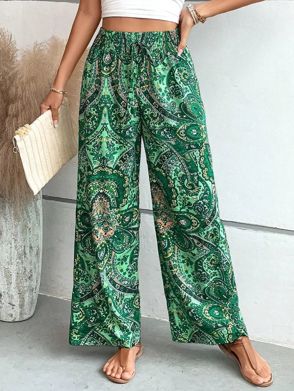 Trendy Printed Wide Leg Pants with Tied Detail showcasing a vibrant green paisley design, made of 100% opaque polyester, perfect for every occasion.