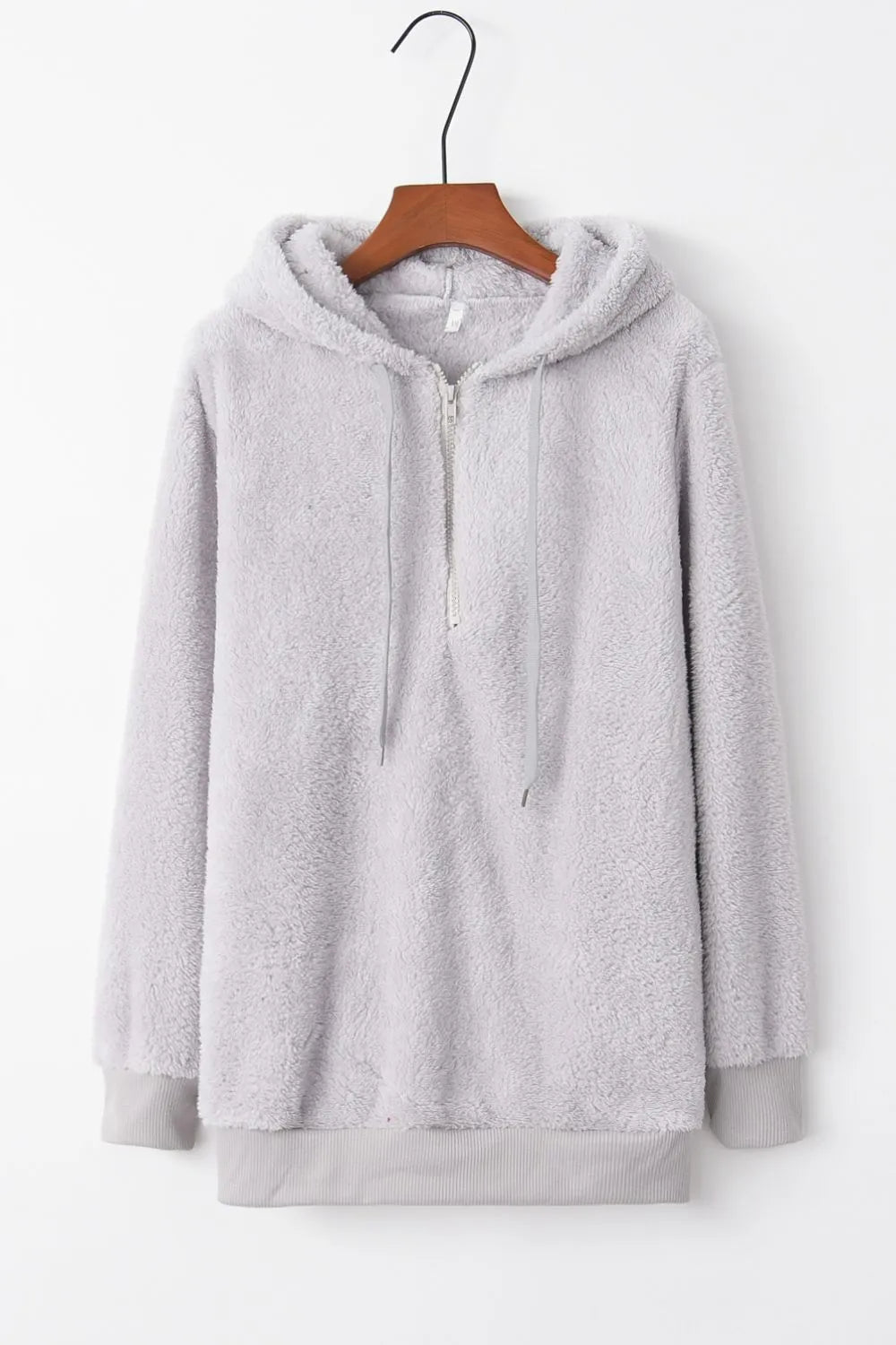 Cozy Full Size Teddy Hoodie with Quarter-Zip and Drawstring, Opaque & Slightly Stretchy, 100% Polyester, displayed on a hanger with a soft texture.