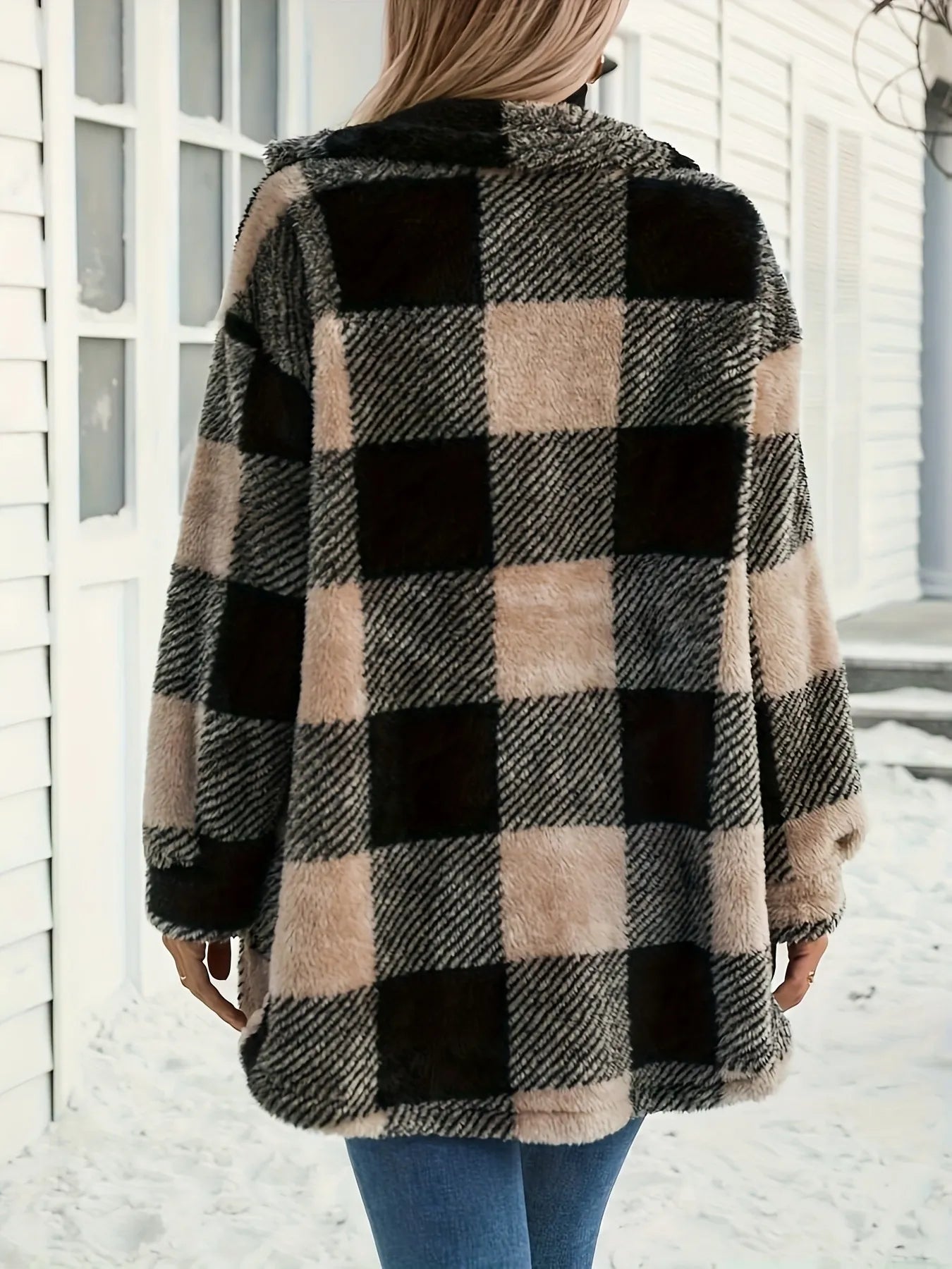 Back view of a woman showcasing the Oversized Button Down Plaid Teddy Coat with Pockets, highlighting its plush texture and stylish plaid design, perfect for winter wear.
