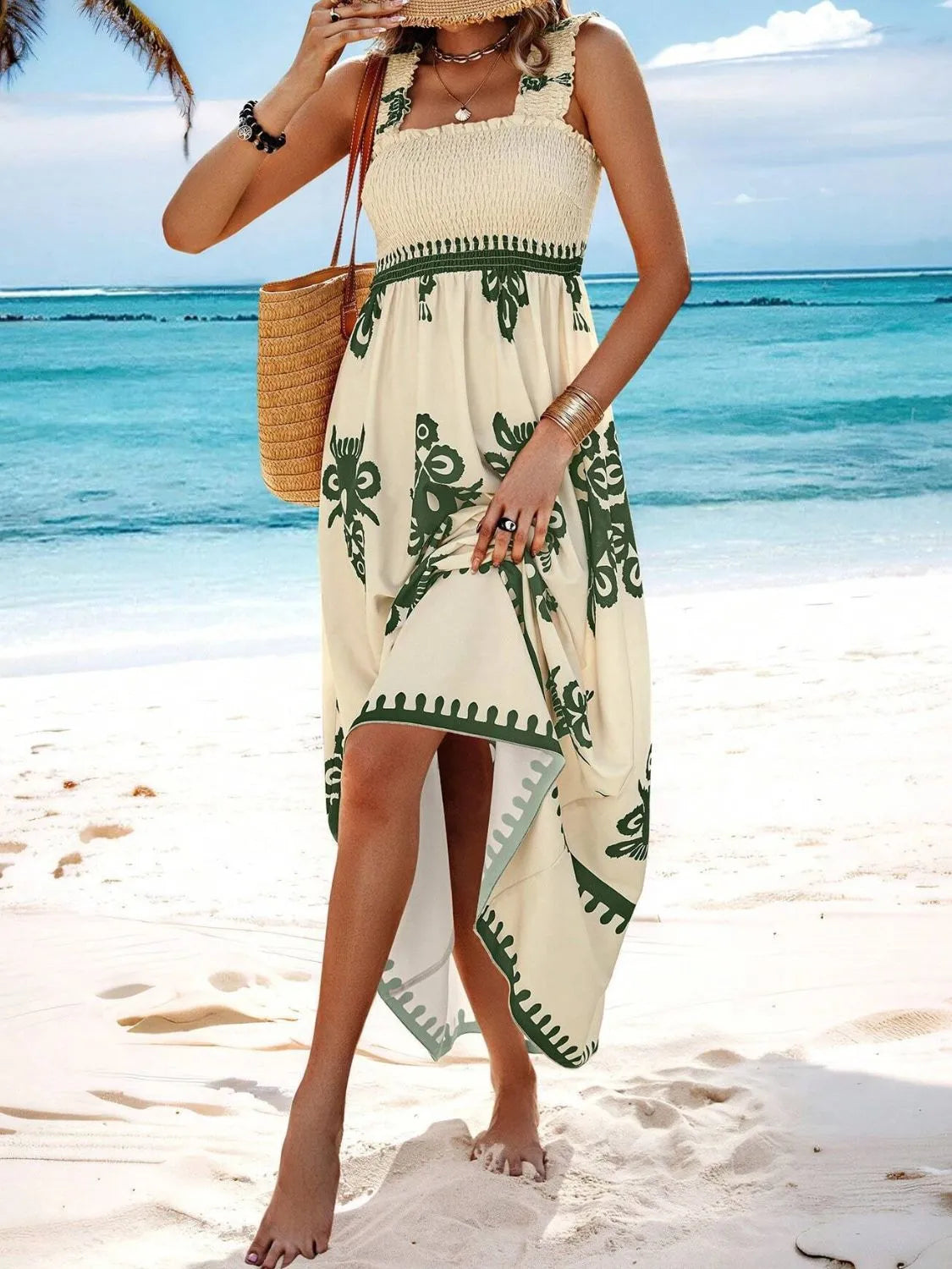 Trendsi Smocked Printed Maxi Dress with Wide Straps - Elegant Opaque, Non-Stretch Design, showcased on a beach against a tropical backdrop, featuring a smocked bodice and intricate green patterns.