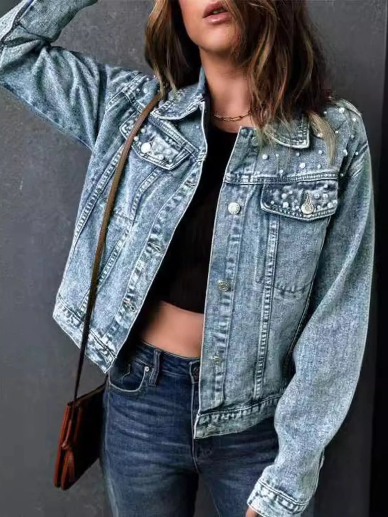 Plus Size Denim Jacket with Pearl Detail and Button Up Closure, Long Sleeve, Pocketed Style, showcasing a fashionable look with a relaxed fit, elegant pearl embellishments, and a modern cropped design.