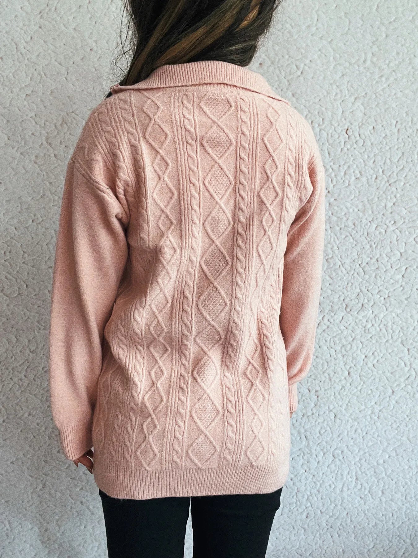 Back view of the Cozy Cable-Knit Texture Zip Collar Long Sleeve Sweater, showing the intricate cable-knit design, making it a fashionable choice for any occasion.