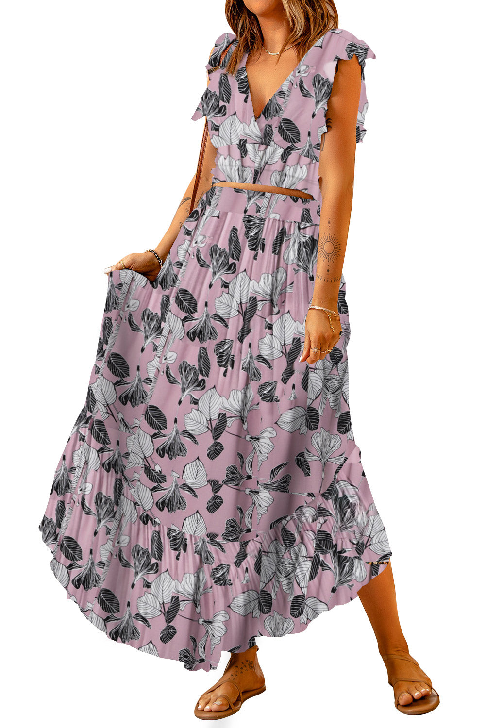 Floral Print Tie-Back Cropped Top & Maxi Skirt Set - Chic Summer Outfit displayed by a model, capturing the airy feel of the pink butterfly print with a flattering silhouette, ideal for warm weather.