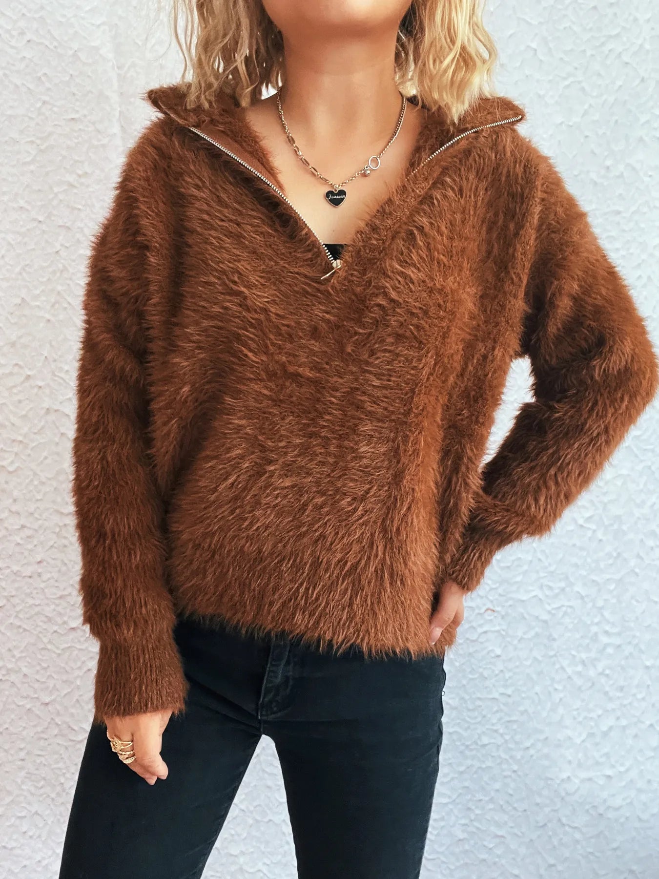 Casual pose of a model wearing Cozy Fuzzy Half-Zip Sweater for Women in cozy brown, featuring a plush texture and chic half-zip, perfect for effortless style in colder weather.