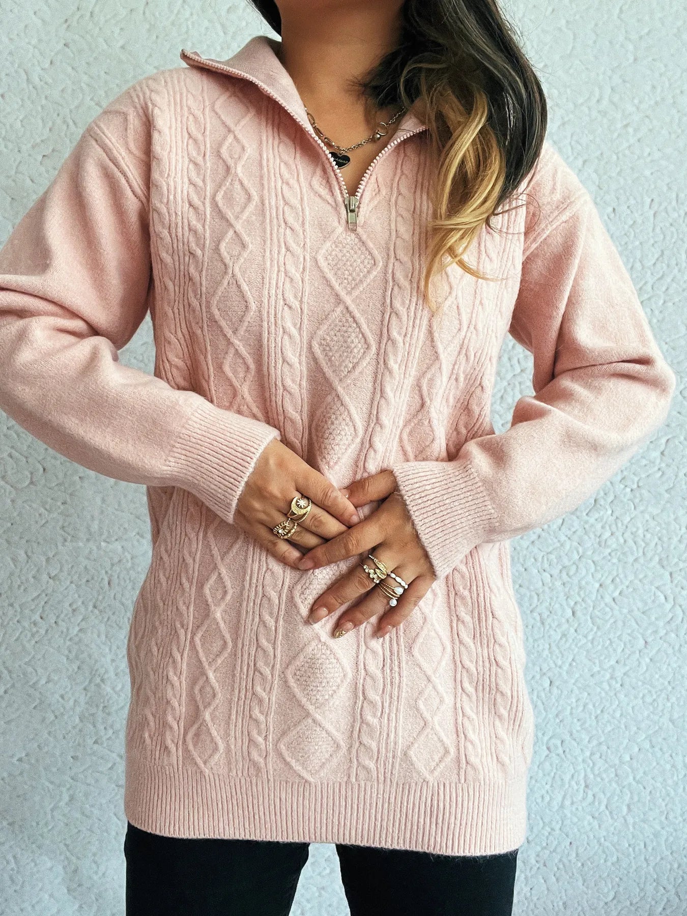 Front view of the Cozy Cable-Knit Texture Zip Collar Long Sleeve Sweater, showcasing its unique cable-knit pattern and comfortable fit, perfect for layering.