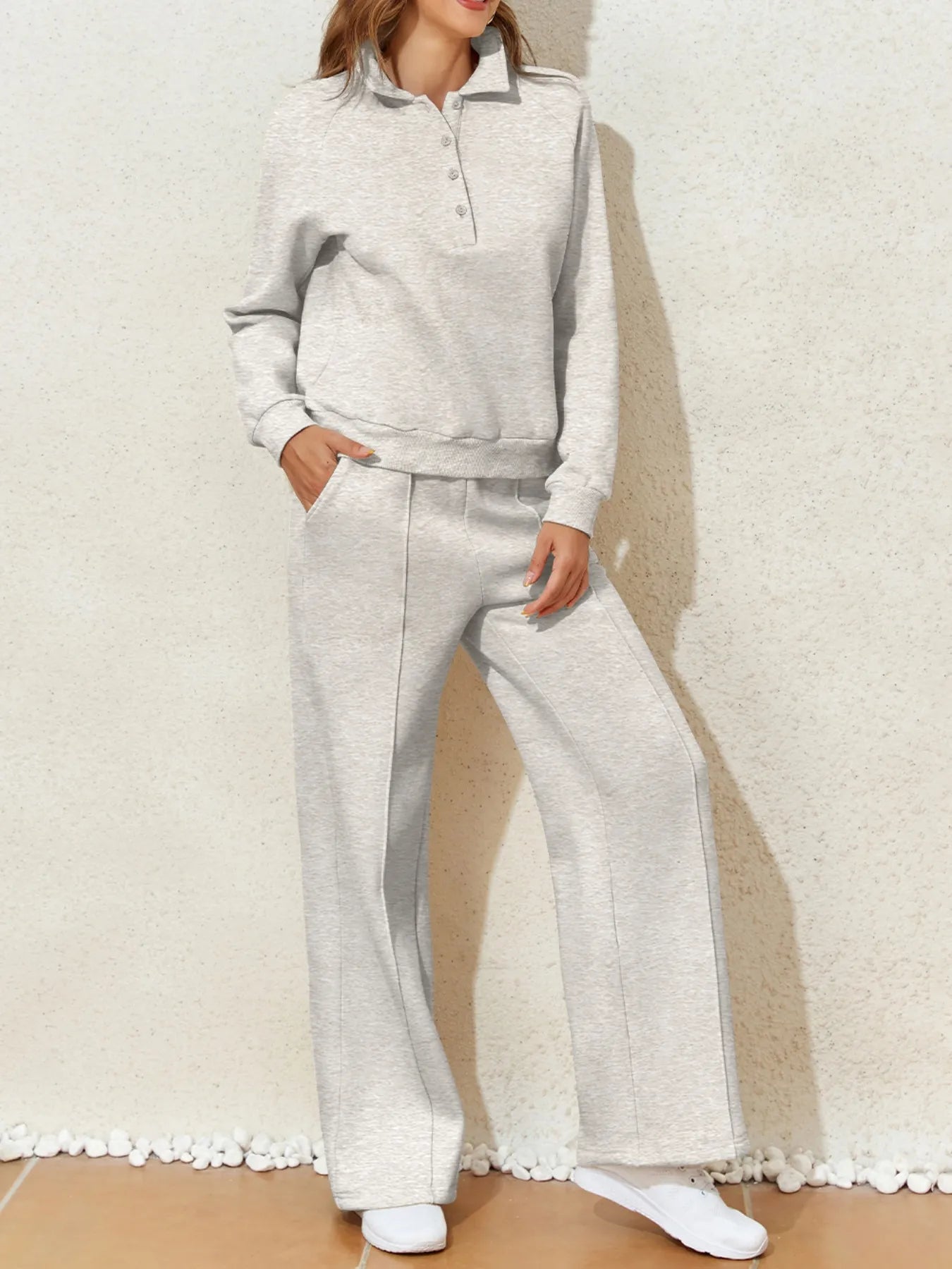Trendsi Collared Sweatshirt & High Waist Pants Two-Piece Active Set - Soft Cotton Blend. Model in a relaxed stance wearing the matching sweatshirt and pants.