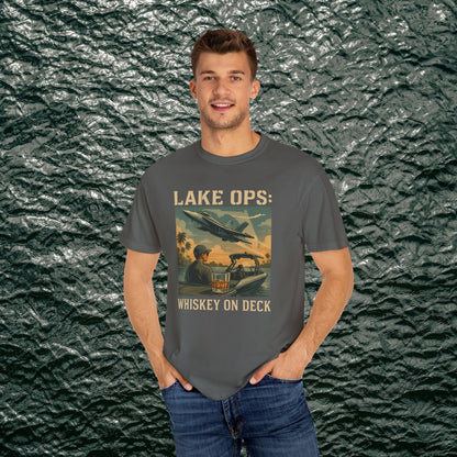 Garment-Dyed Comfort Tee For Adults showcasing 'LAKE OPS: WHISKEY ON DECK' with a scenic design, modeled by a man, available in sizes S-4XL.
