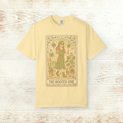 Rooted One Tarot Tee in yellow color, featuring an eye-catching tarot graphic of a woman amidst greenery, made with ethically sourced cotton.