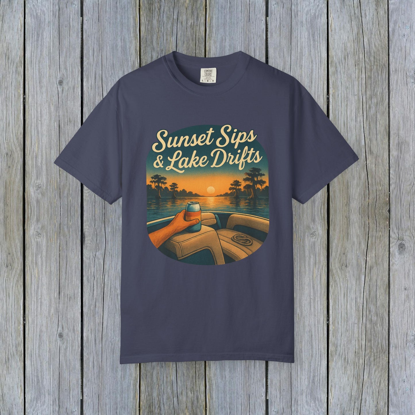 Lake Drifts T-Shirt in navy blue featuring sunset sips artwork, suitable for relaxed gatherings.