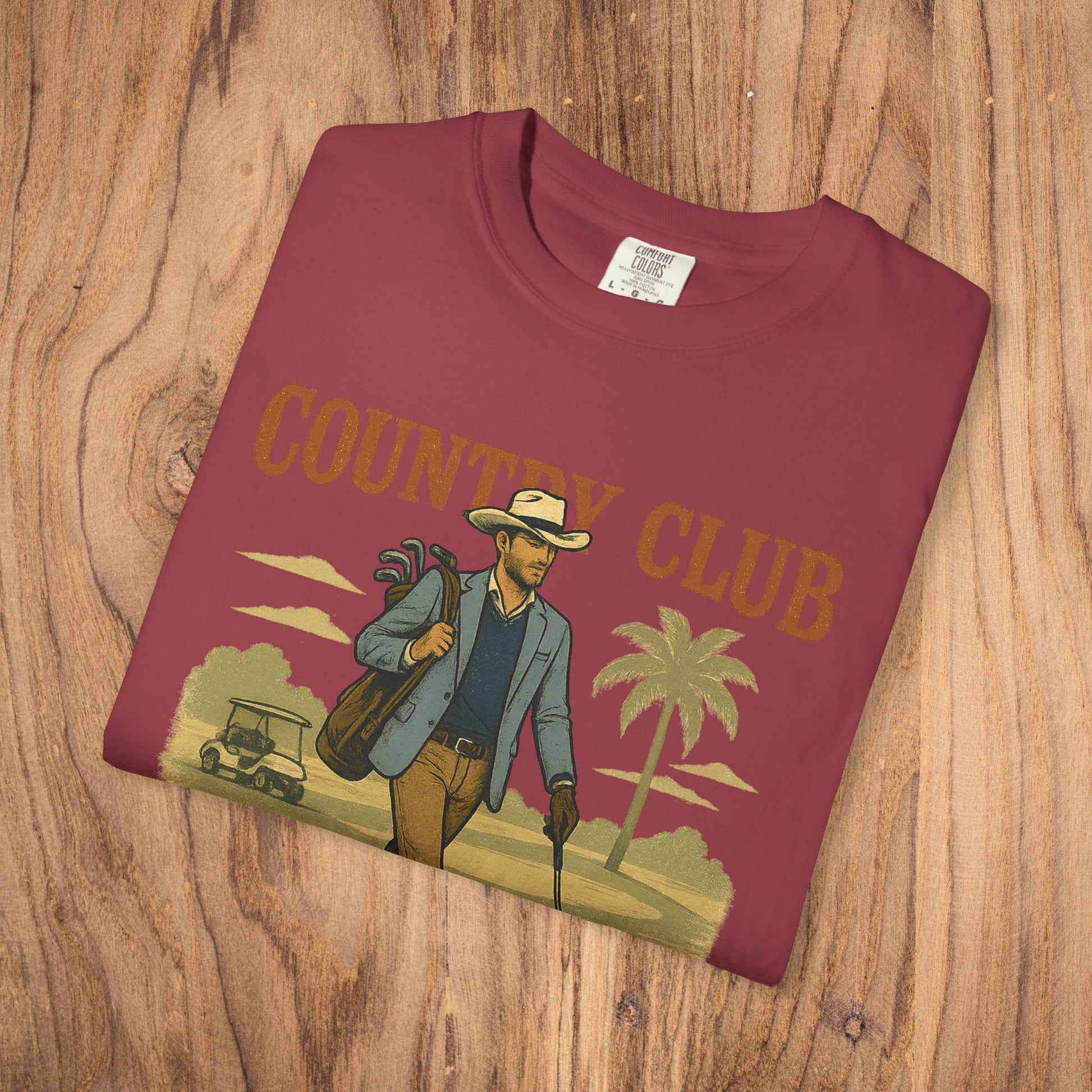 Front view of the Country Club Cowboy Graphic Tee in maroon, featuring a stylish cowboy graphic, perfect for casual wear.