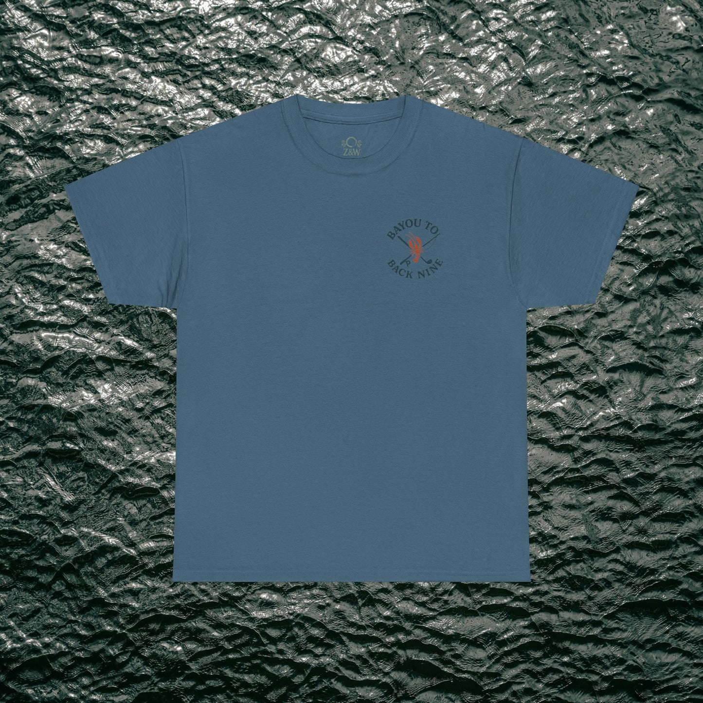 Bayou To Back Nine Softstyle Golf Tee in soft blue, featuring eye-catching design elements, perfect for relaxed days and casual events.
