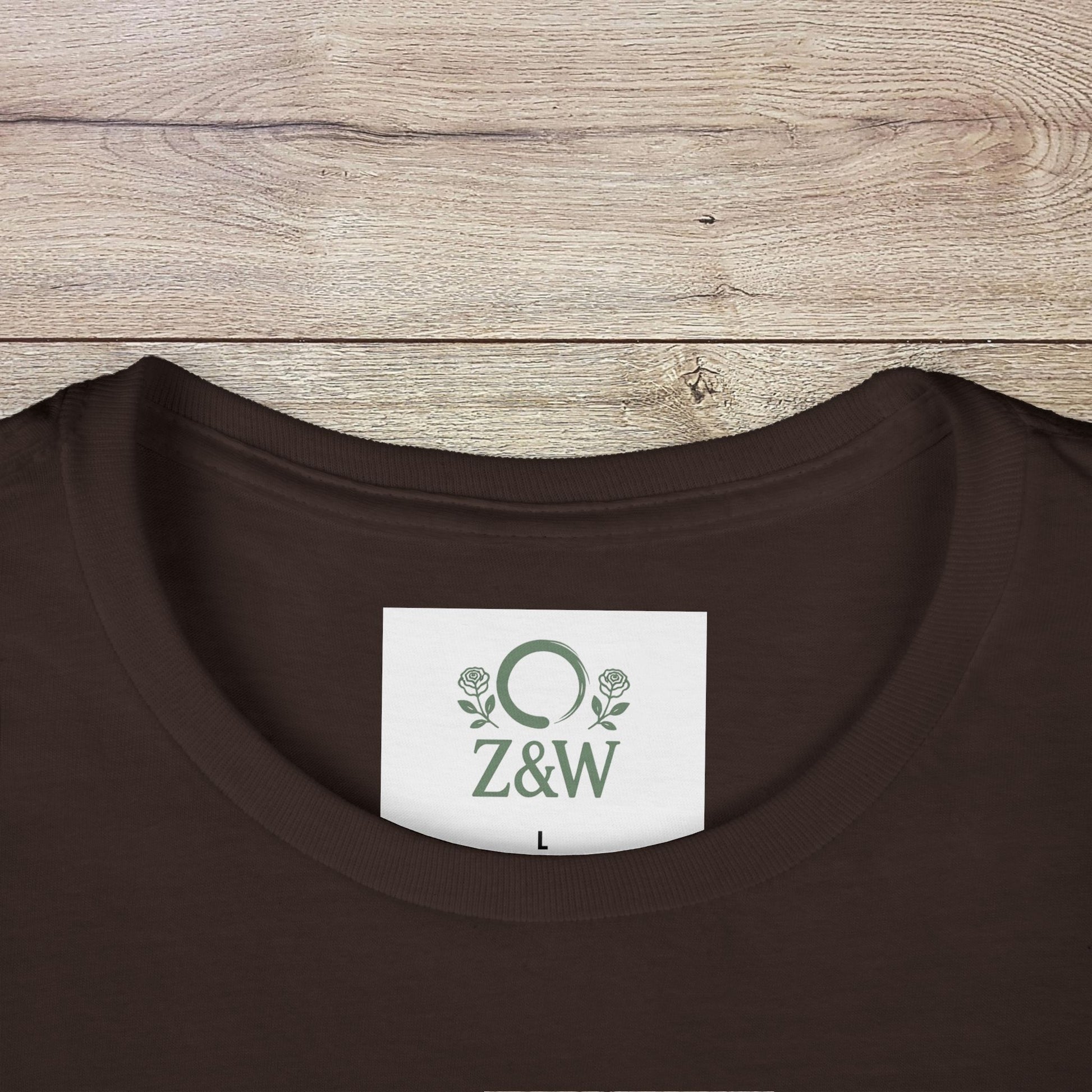 Close-up of the tag on the Sippin' Through The Seasons Slim Fit Tee in brown, featuring a tear-away label for added comfort and style.