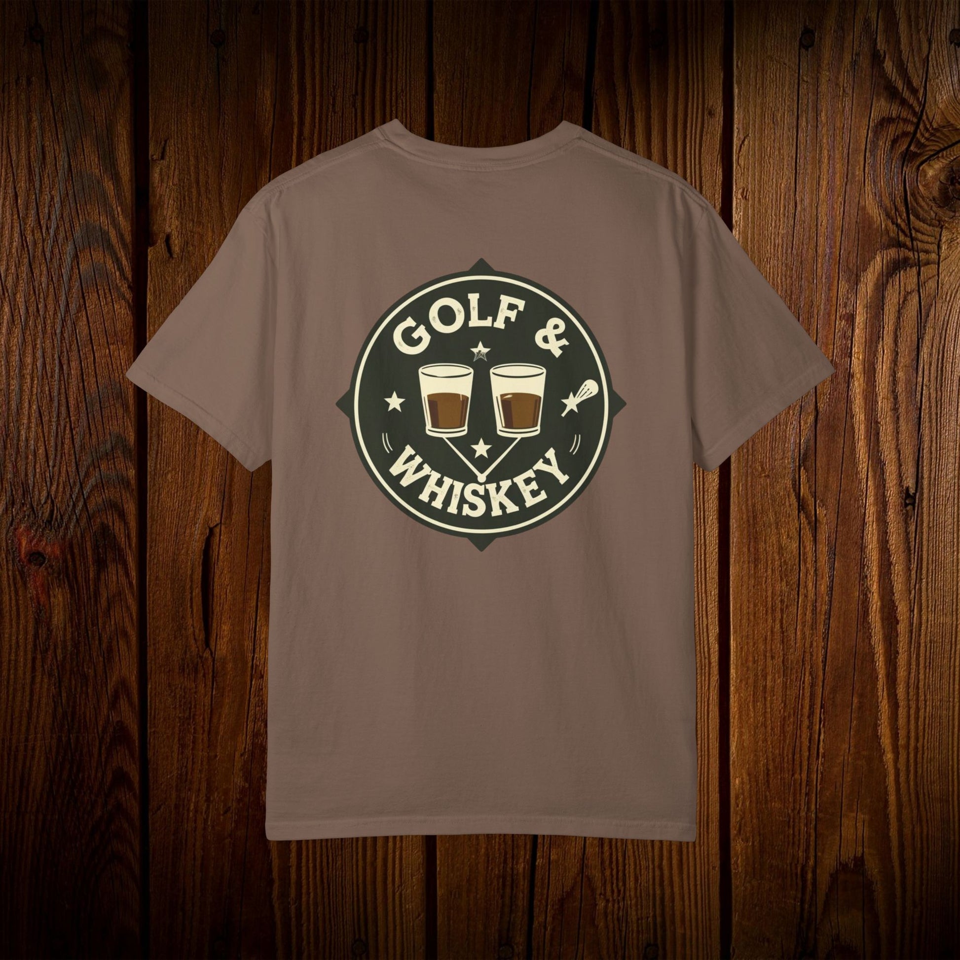 Men's Golf & Whiskey Tee featuring a trendy back graphic with whiskey and golf motifs on a natural-colored shirt, a great choice for golf and whiskey enthusiasts.