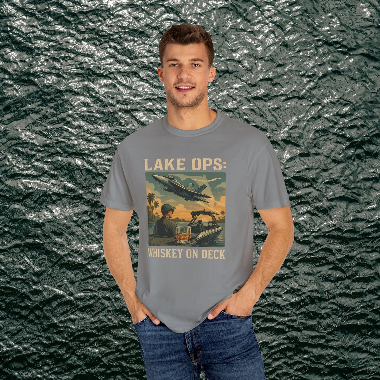 Garment-Dyed Comfort Tee for Adults depicting Lake Ops Whiskey on Deck graphic in grey, crafted from soft 100% ring-spun cotton. Sizes S to 4XL, ideal for laid-back occasions.