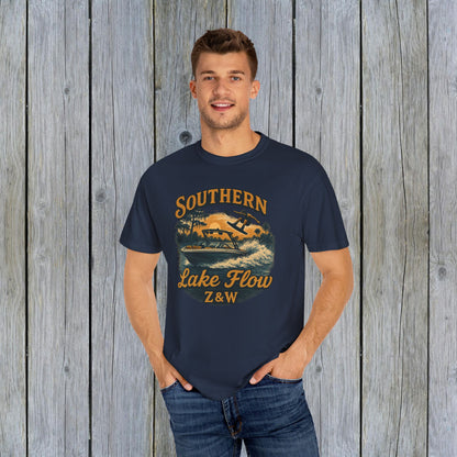 Model showcasing the navy blue Southern Lake Flow T-Shirt with a stylish wakeboarding graphic, perfect for those who value fashionable, eco-friendly apparel.