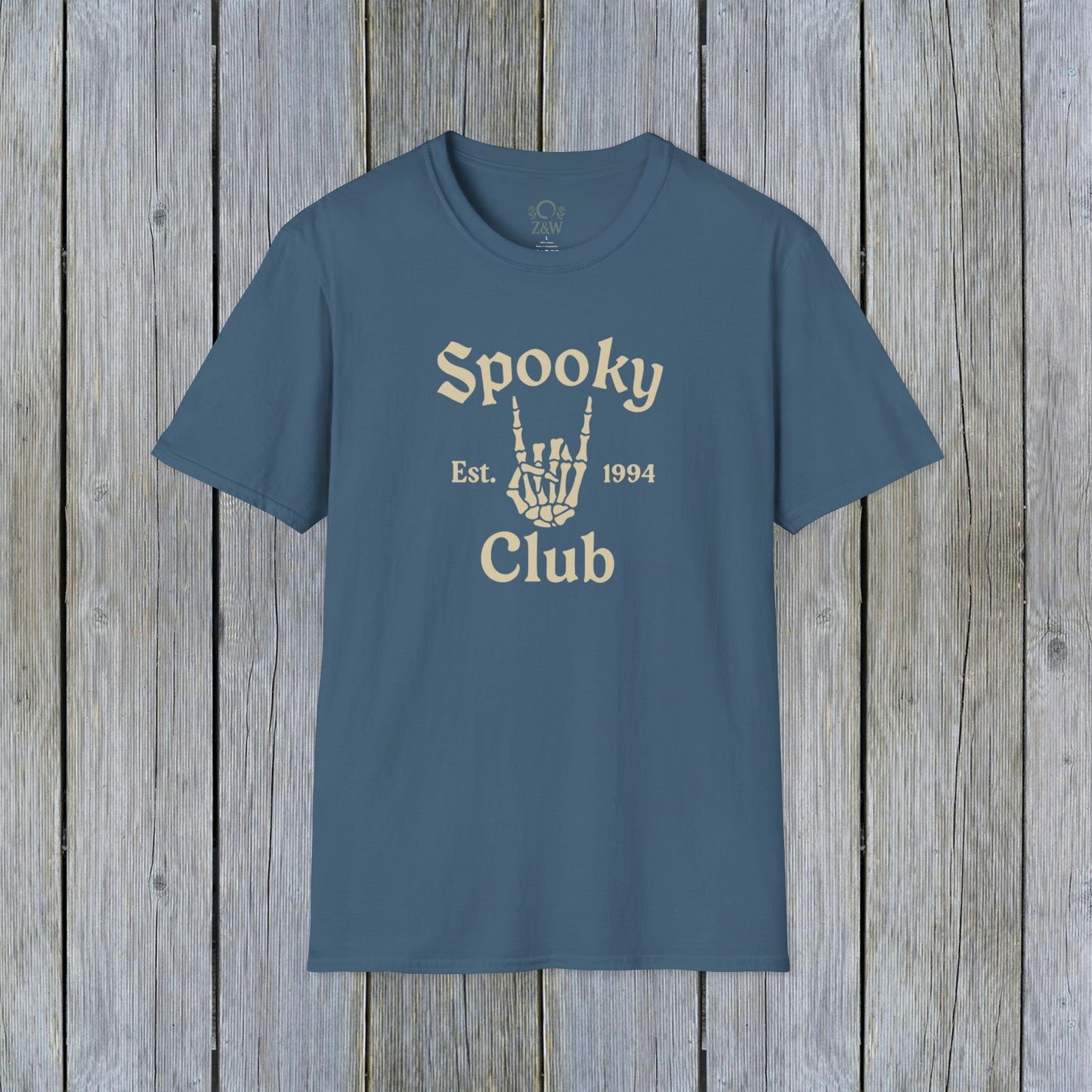 Unisex Spooky Club Tee in blue, crafted from soft 100% cotton, featuring a skeleton hand graphic and 'Spooky Club Est. 1994' text, perfect for Halloween style.