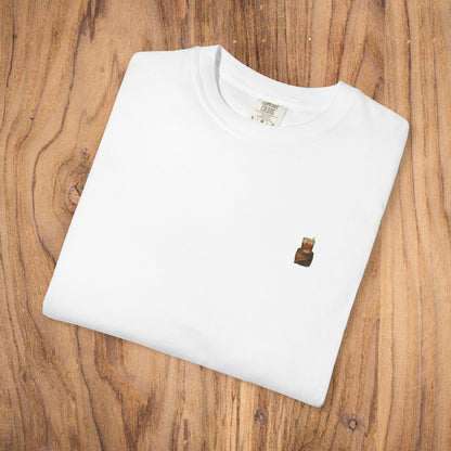 Folded Premium Southern Made T-Shirt in white featuring a small logo, perfect for those seeking stylish casual wear.