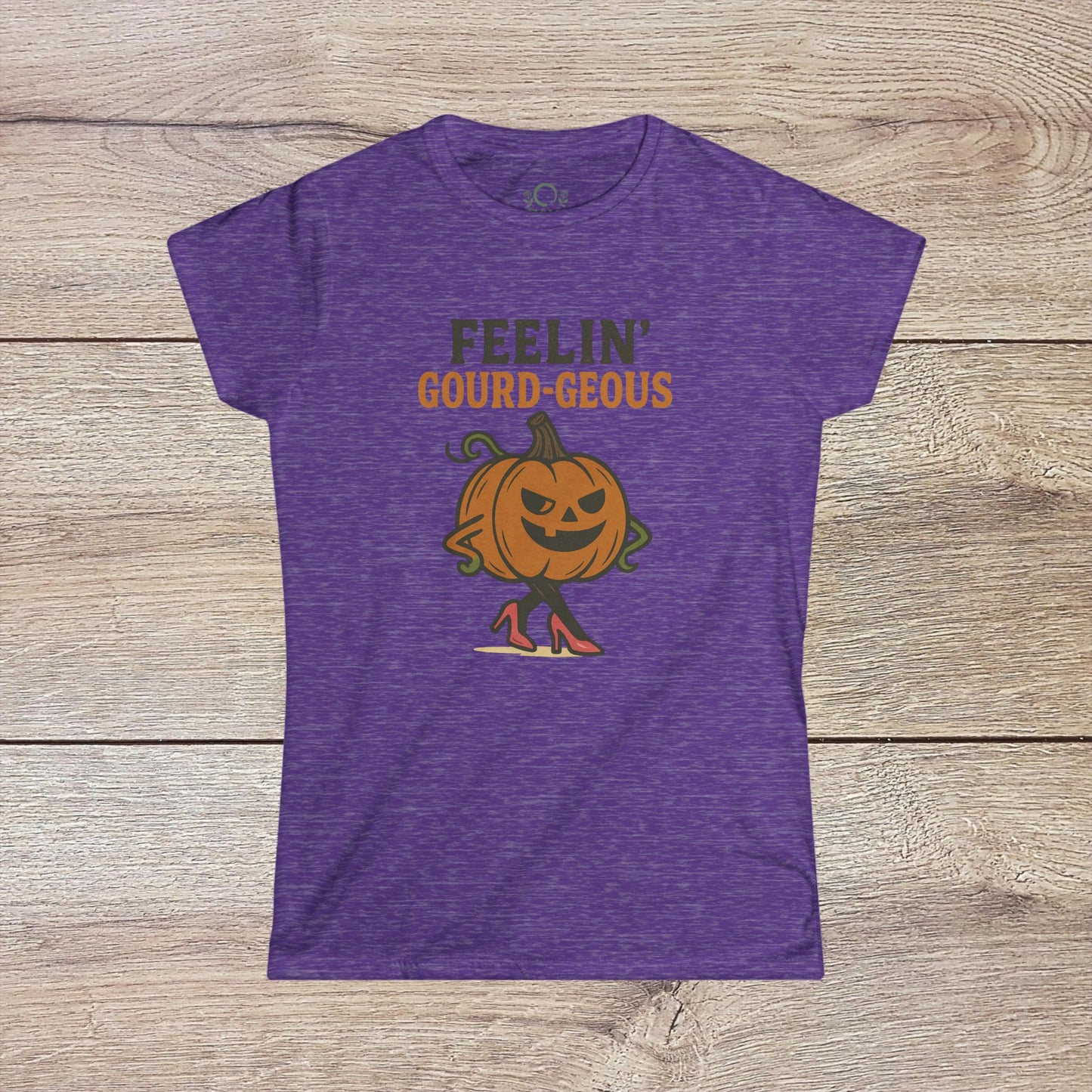 Gourd-geous Halloween Pumpkin T-Shirt in purple, designed with a chic pumpkin graphic in heels, perfect for trendy fall apparel.