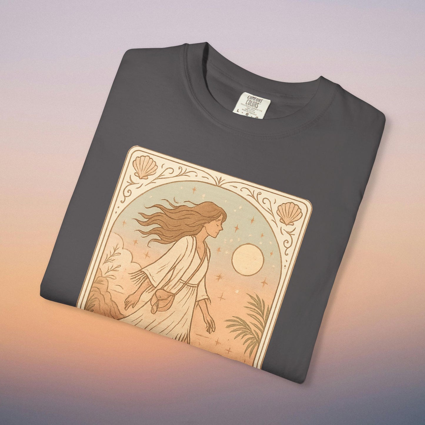 Wanderer Tarot Graphic Tee in charcoal gray, featuring a captivating design of a woman walking under the moonlight. Ethically crafted from 100% cotton, this tee offers a unique style and comfort in sizes S to 4XL.